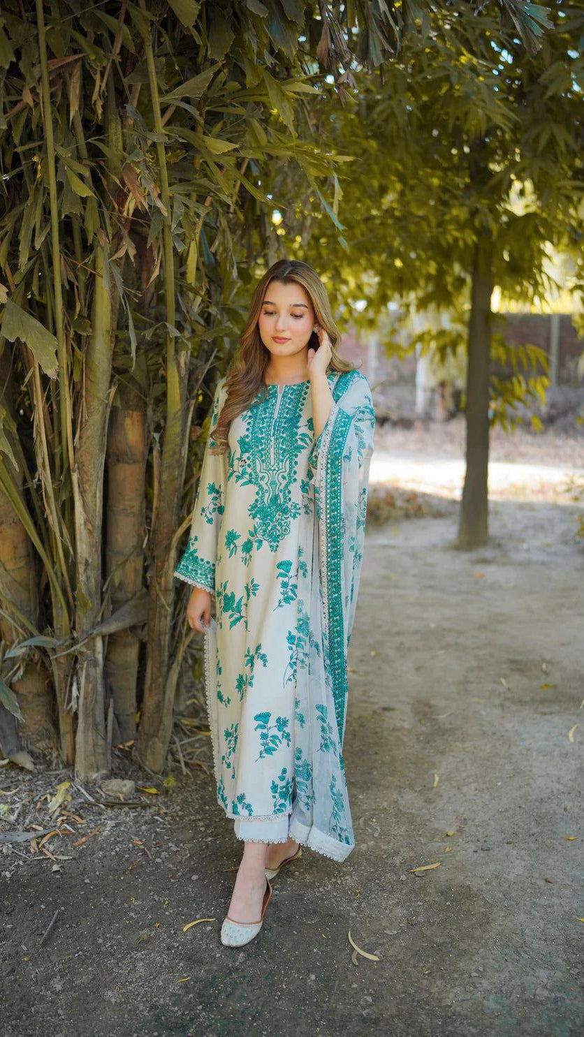 Aneela’s replica lawn suit with 9mm sequin work and chiffon trouser