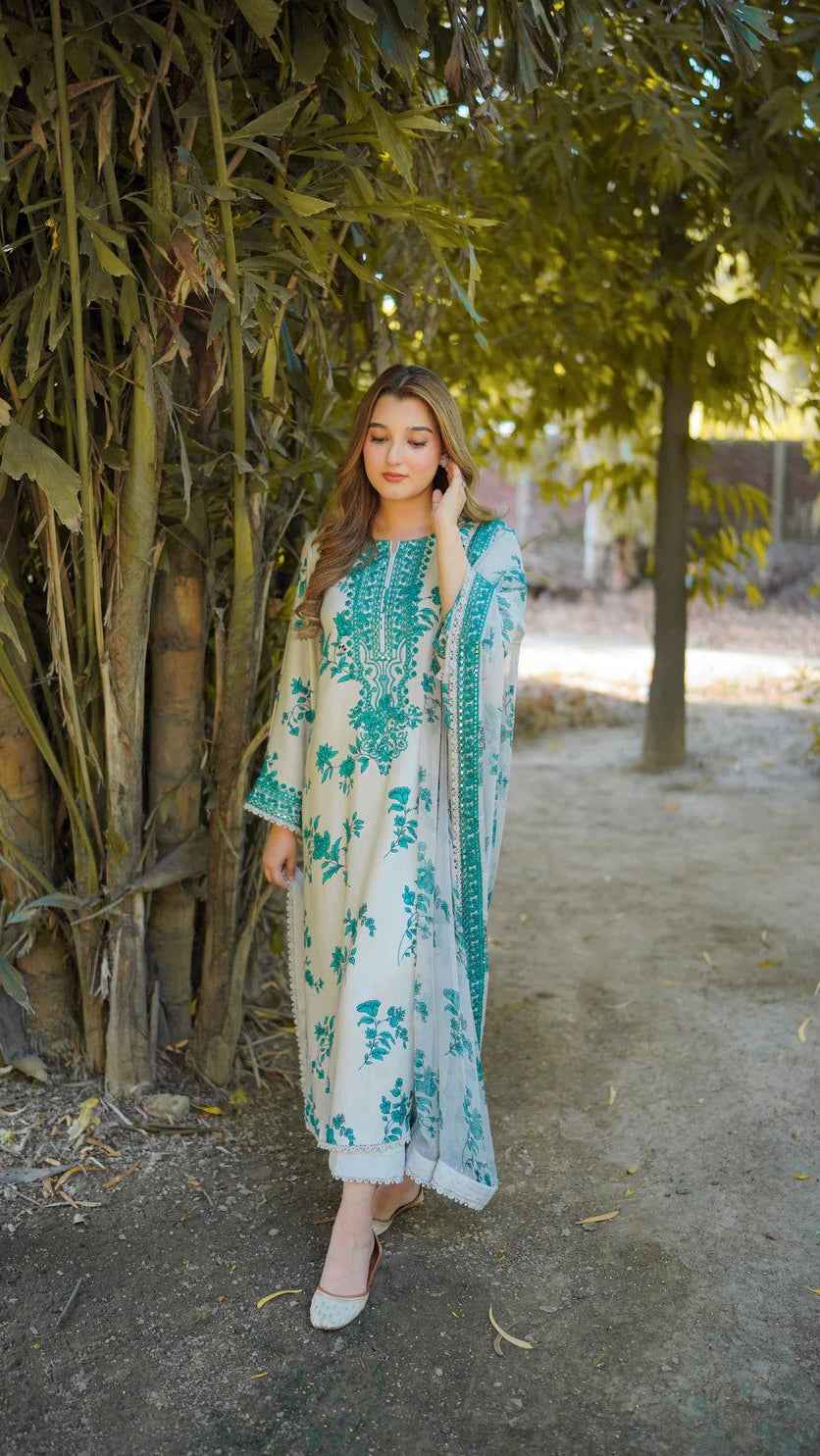Aneela’s replica lawn suit with 9mm sequin work and chiffon trouser